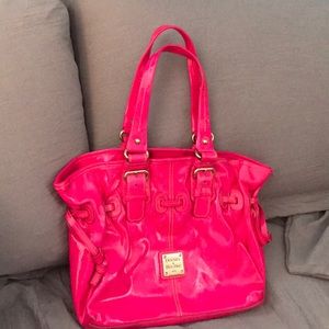 Slightly worn hot pink Dooney & Bourke purse